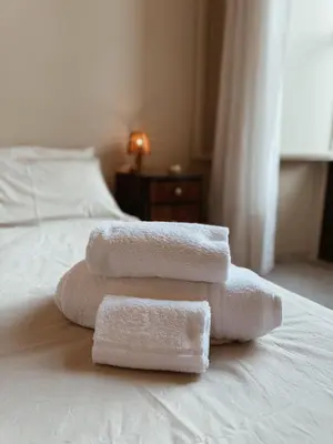 Letto o letti in una camera di Charme Siciliano nel centro storico di Catania a Casa Ciuciù