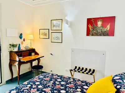 Letto o letti in una camera di Sangiuliano Suite