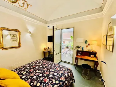 Letto o letti in una camera di Sangiuliano Suite