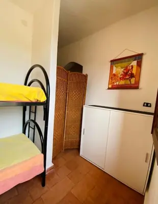 Letto o letti in una camera di Villa Lunè