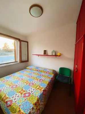 Letto o letti in una camera di Villa Lunè