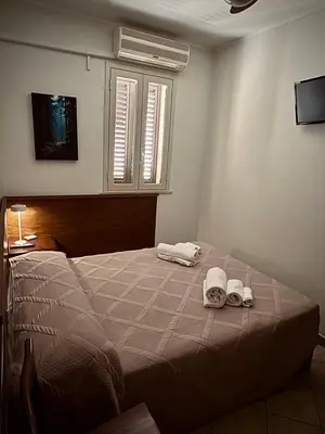 Letto o letti in una camera di Freya Rooms