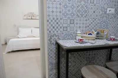 Letto o letti in una camera di casa vacanza la Farfalla