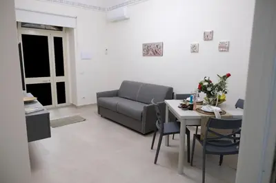Area soggiorno di casa vacanza la Farfalla