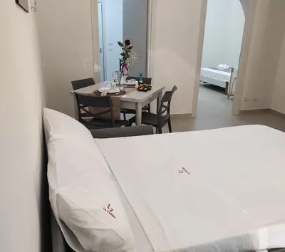 Letto o letti in una camera di casa vacanza la Farfalla