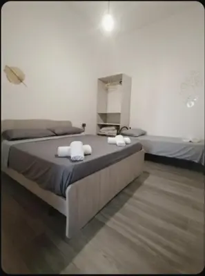 Letto o letti in una camera di Persi nel sud
