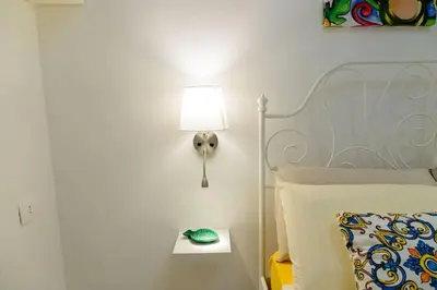 Letto o letti in una camera di La Terrazza in fiore