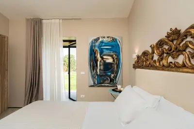 Letto o letti in una camera di Villa Agnese