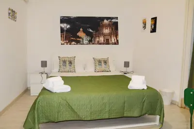 Letto o letti in una camera di Casa Filippo