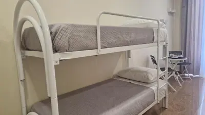 Letto o letti in una camera di Ferrara Home 2