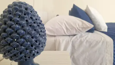 Letto o letti in una camera di Ferrara Home 2