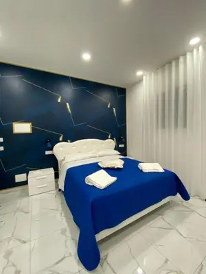 Letto o letti in una camera di Seven7 Rooms