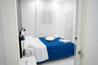 Letto o letti in una camera di Seven7 Rooms