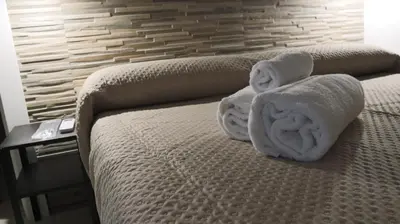 Letto o letti in una camera di Donna Flavia summer relax