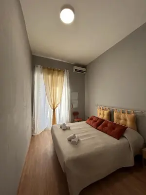Letto o letti in una camera di Gammazita Home