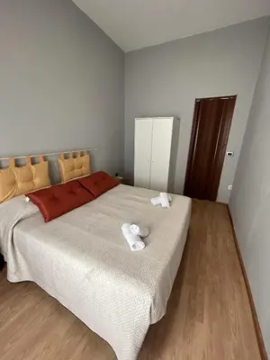 Letto o letti in una camera di Gammazita Home