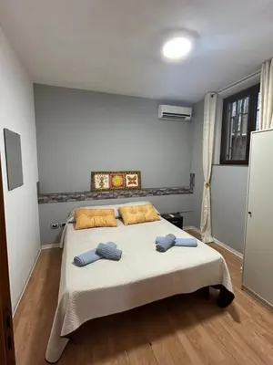 Letto o letti in una camera di Gammazita Home