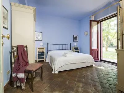 Letto o letti in una camera di Villa Del Parco