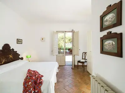 Letto o letti in una camera di Villa Del Parco