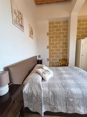 Letto o letti in una camera di Avola Opera House