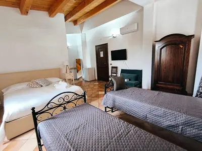 Letto o letti in una camera di Avola Opera House