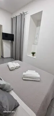Letto o letti in una camera di Castello Ursino house