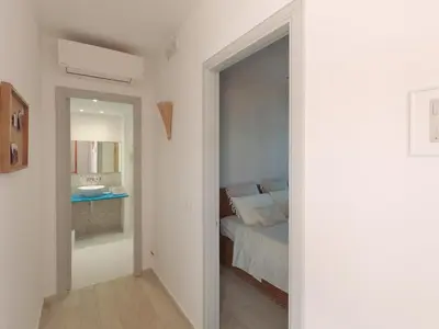 Letto o letti in una camera di Casa del Mar, Brucoli