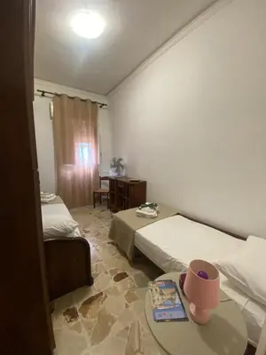 Letto o letti in una camera di Casa OXENA