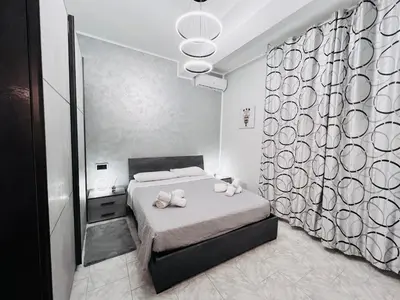Letto o letti in una camera di La Bella Sicilia Suite