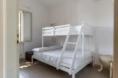 Letto o letti in una camera di Villetta al Plemmirio by Wonderful Italy