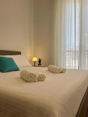 Letto o letti in una camera di Sun House