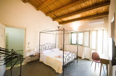 Letto o letti in una camera di San Domenico