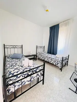 Letto o letti in una camera di VIBEAMAR