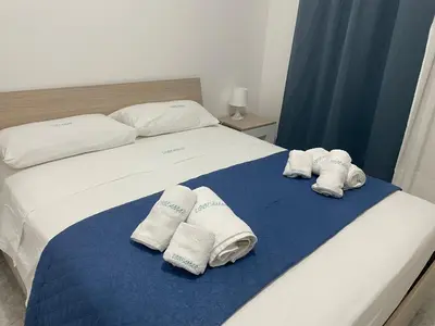 Letto o letti in una camera di VIBEAMAR