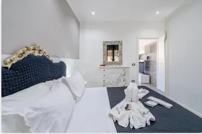 Letto o letti in una camera di Casa Helios