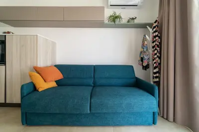 Area soggiorno di GuestHost - Borgo 84 Marzamemi - Gelsi Apartament
