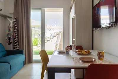 Area soggiorno di GuestHost - Borgo 84 Marzamemi - Gelsi Apartament