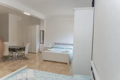 Letto o letti in una camera di villa corinzia 2