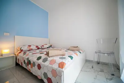 Letto o letti in una camera di Porto Ammare apartment - SiciliaVacanza