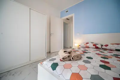 Letto o letti in una camera di Porto Ammare apartment - SiciliaVacanza