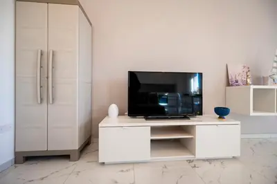 TV o dispositivi per l'intrattenimento presso Porto Ammare apartment - SiciliaVacanza