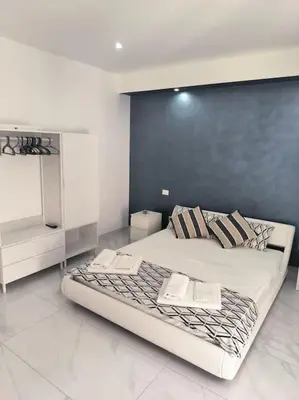 Letto o letti in una camera di Blu Mare