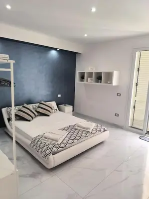 Letto o letti in una camera di Blu Mare