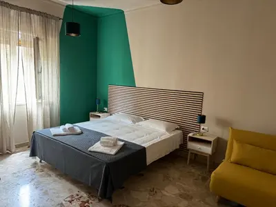 Letto o letti in una camera di Casa Corso