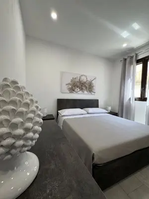 Letto o letti in una camera di La dimora delle rose