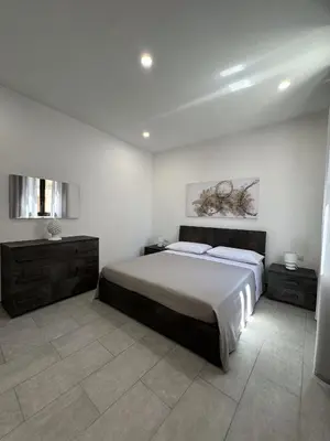 Letto o letti in una camera di La dimora delle rose