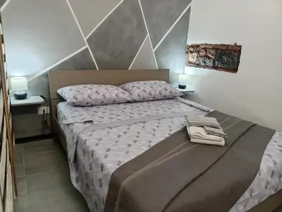 Letto o letti in una camera di Dimora la FabLa