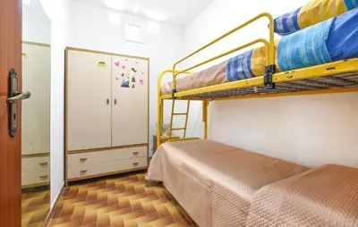 Letto o letti in una camera di Casa Vacanza Scarantino 1