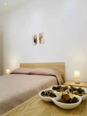 Letto o letti in una camera di Il Cortiletto Casa Vacanze