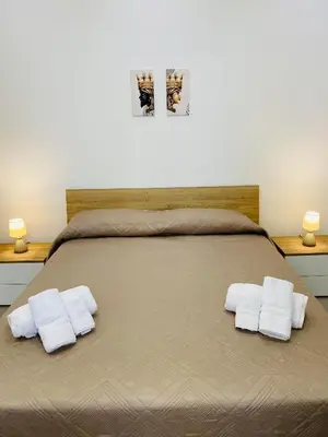 Letto o letti in una camera di Il Cortiletto Casa Vacanze